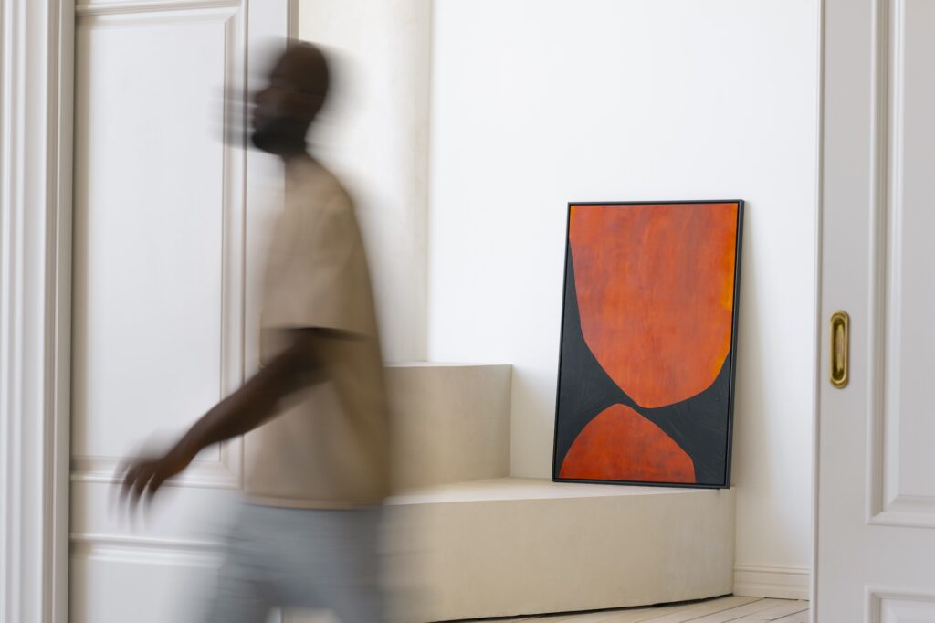 Walking through a room with a print in an architectural room